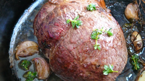 a succulent roast flavored with thyme, lemon and garlic